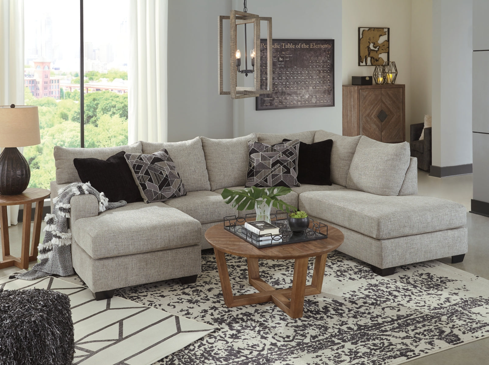 Light gray sectional with chaise top